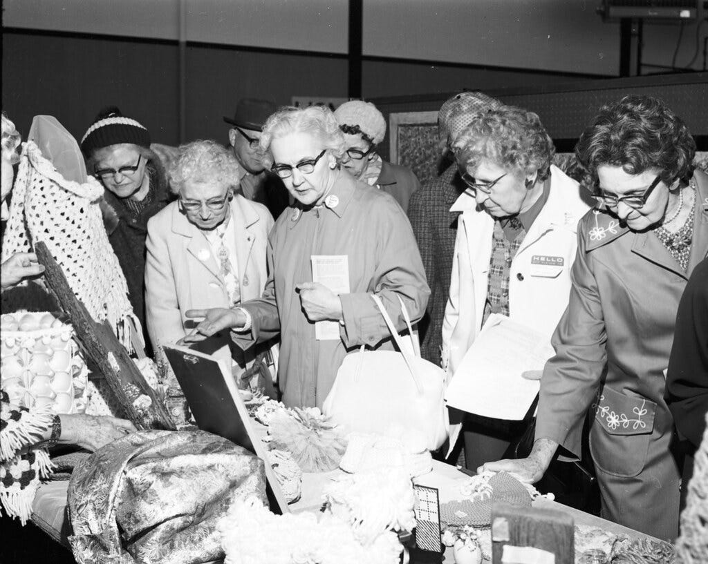 Women shopping at a Senior Citizen Fair at Seattle Center in 1973.