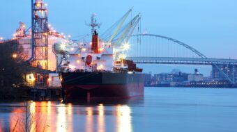 photo of container/cargo ship anchored at Port of Portland